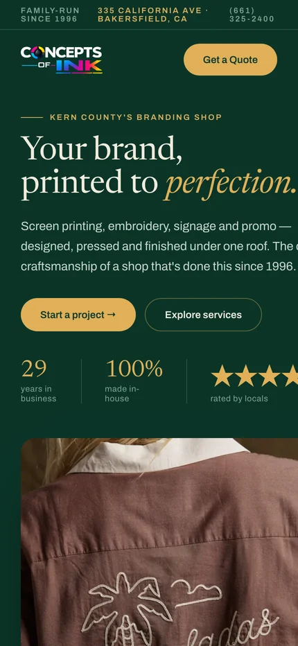 The Emerald direction on a phone: deep green with a serif headline reading Your brand, printed to perfection