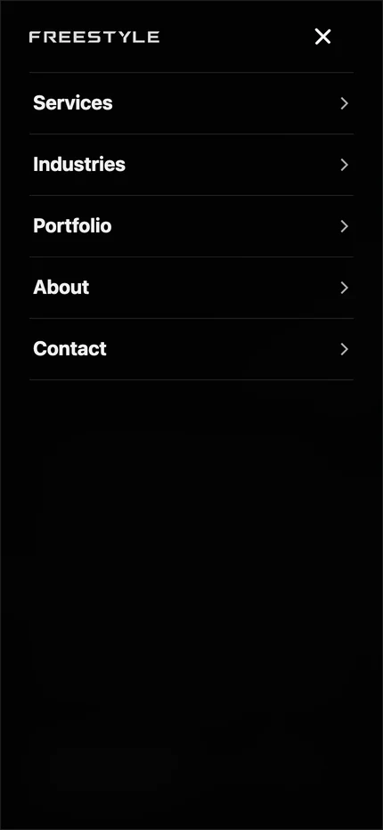 The Freestyle mobile menu with Services, Industries, Portfolio, About, and Contact
