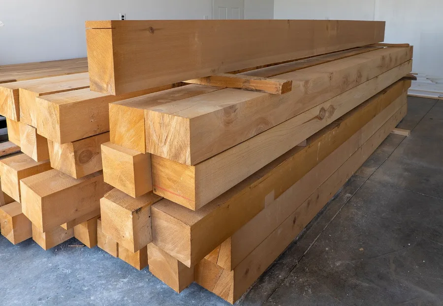 Stacked rough-sawn cedar timbers