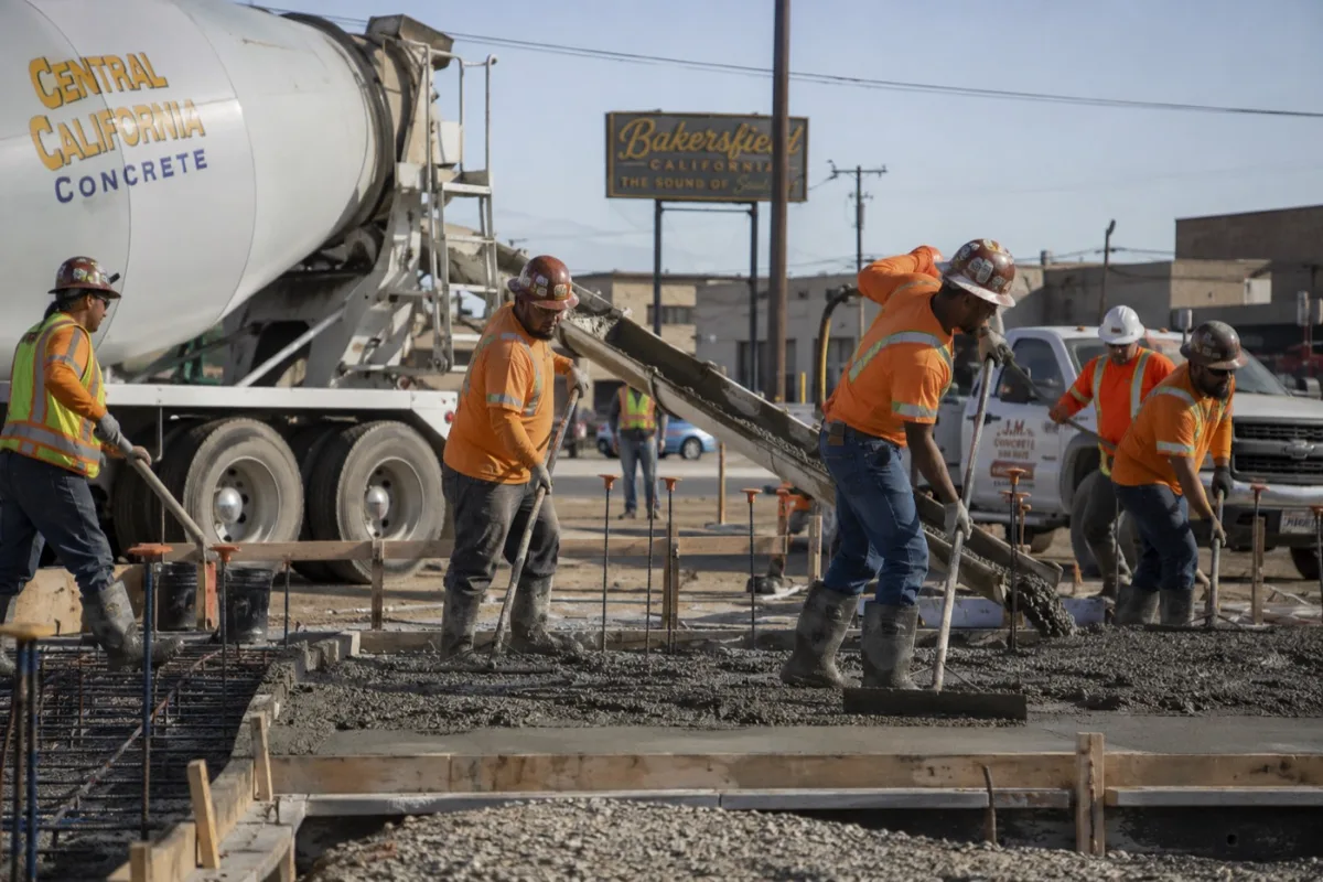 Commercial concrete crew placing a foundation